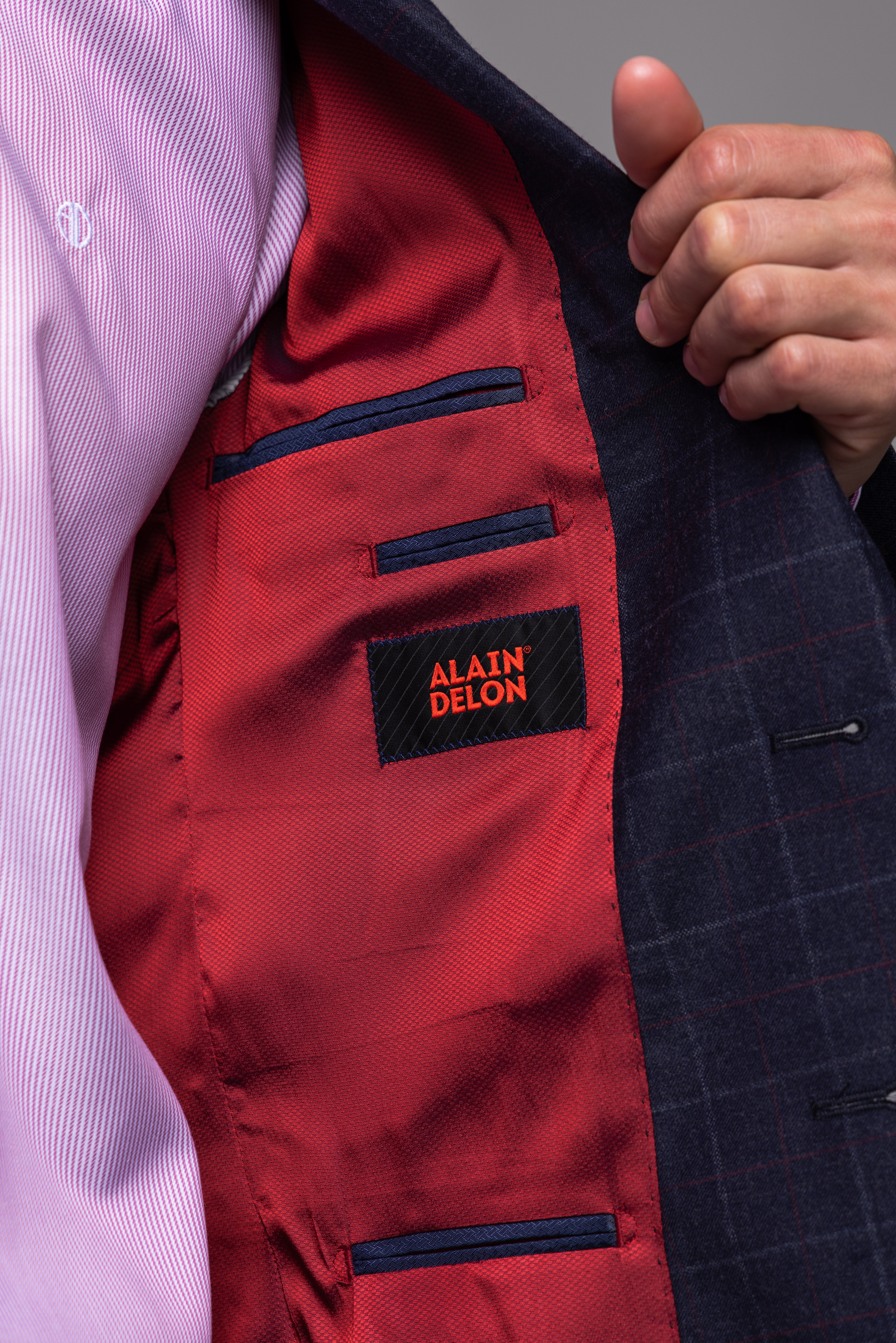 Modré vlnené sako s rúžovým károm