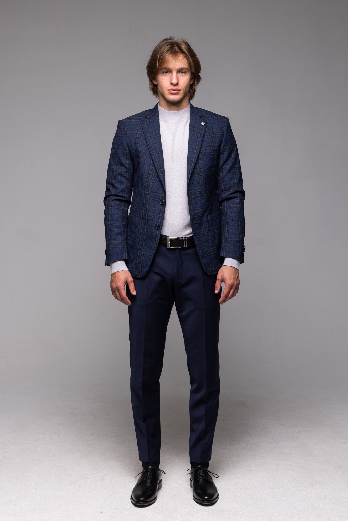 Modré vlnené sako so sivým károm