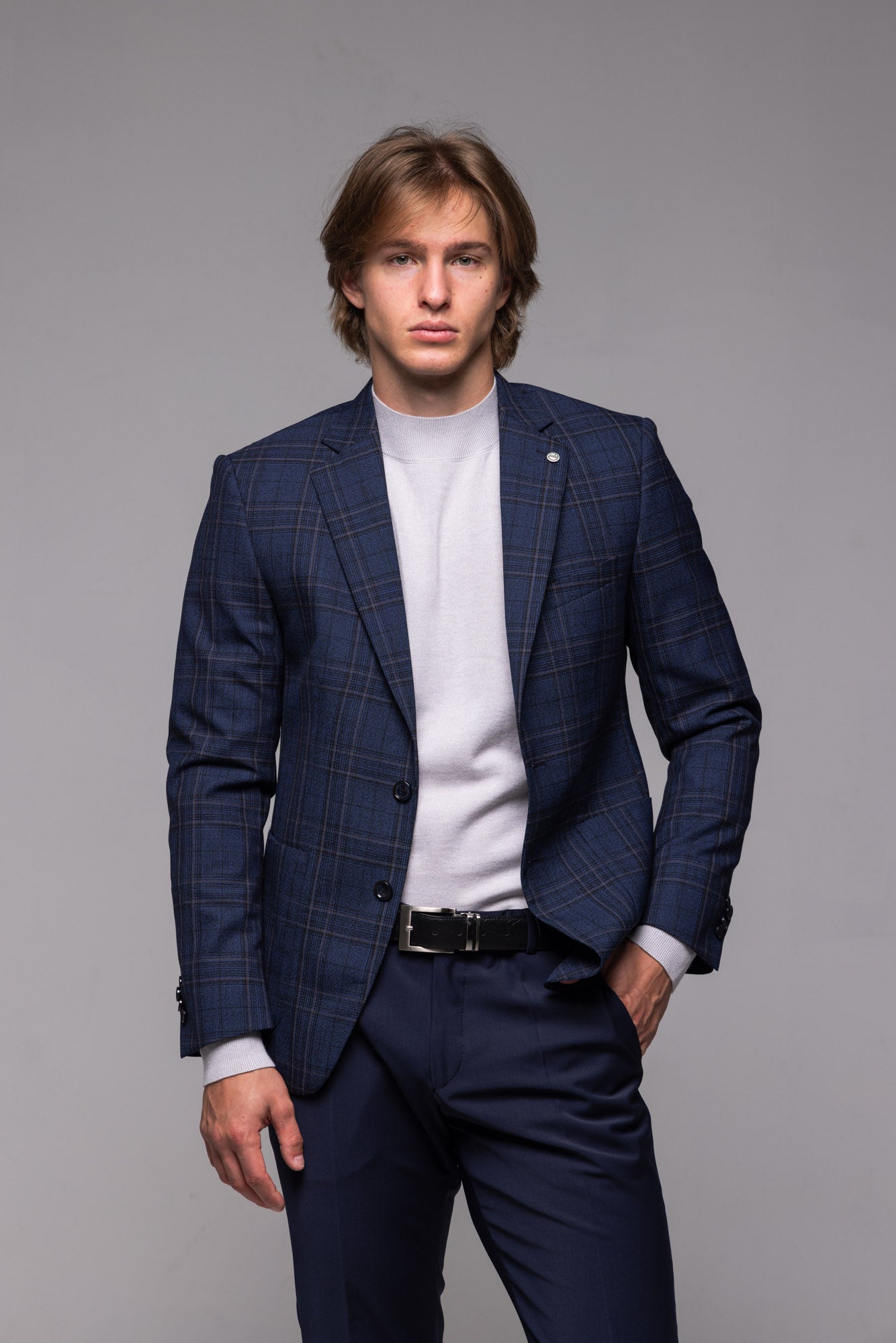 Modré vlnené sako so sivým károm